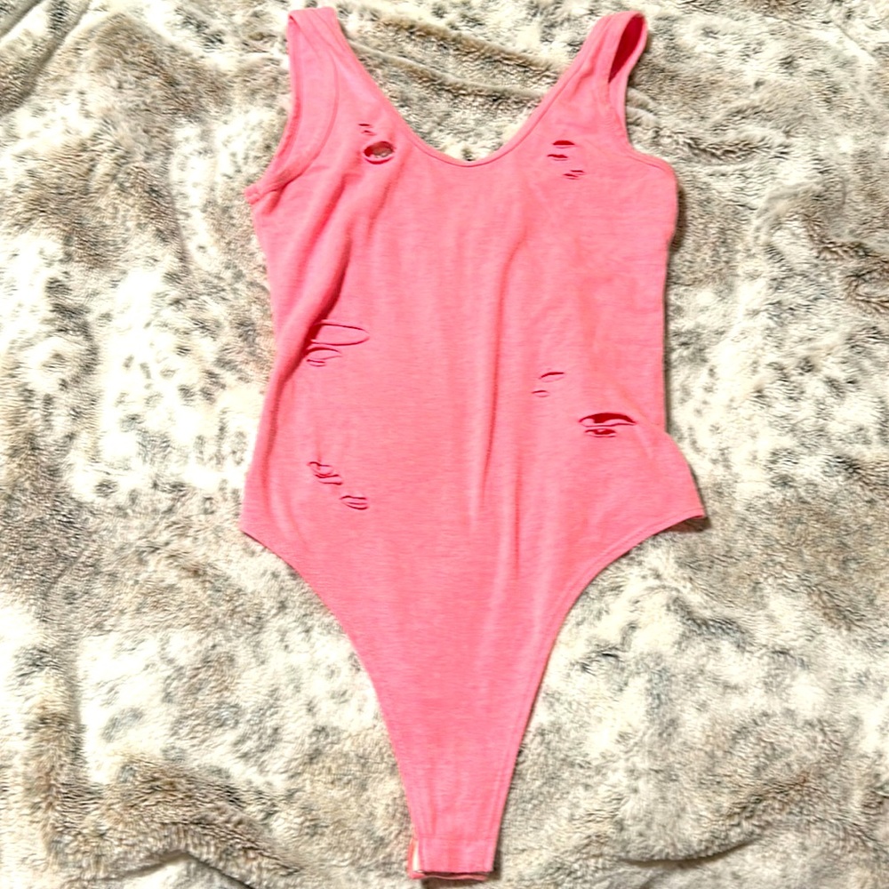 Pink ripped body suit